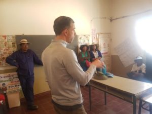 Dr. Ricardo Videla speaking to a group of people