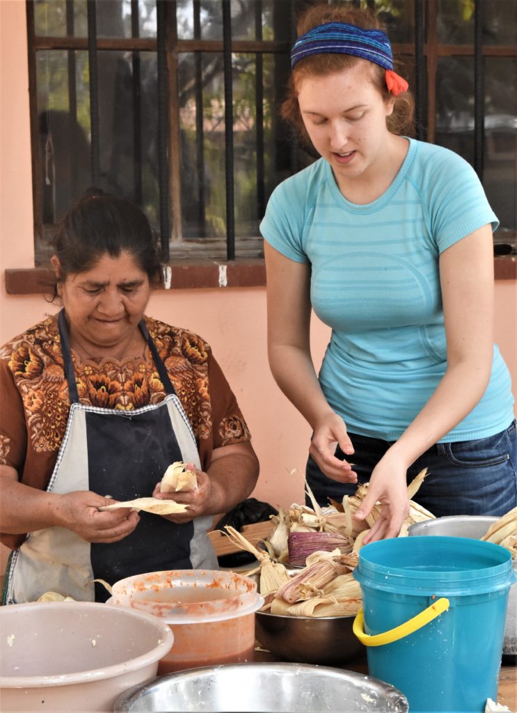 Anderson learning how to make local food in Guatemala.