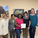 Ofori receiving her certificate for the completion of her USDA FEP Fellowship Program in December of 2023.