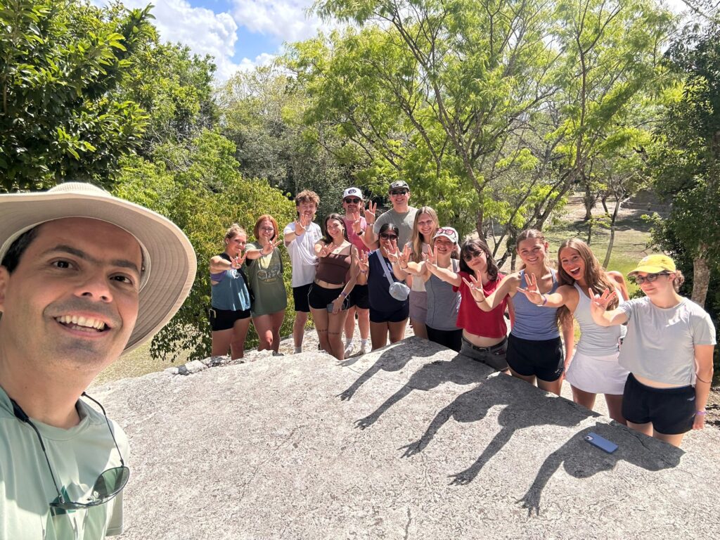 A group of students posed smiling for a photo.